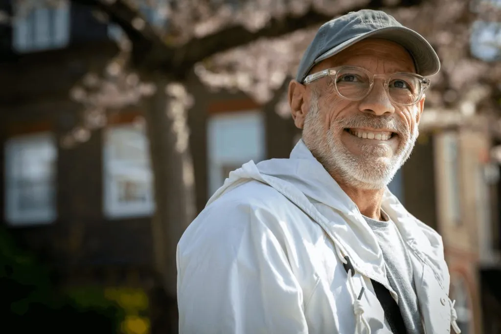smiling older man outside