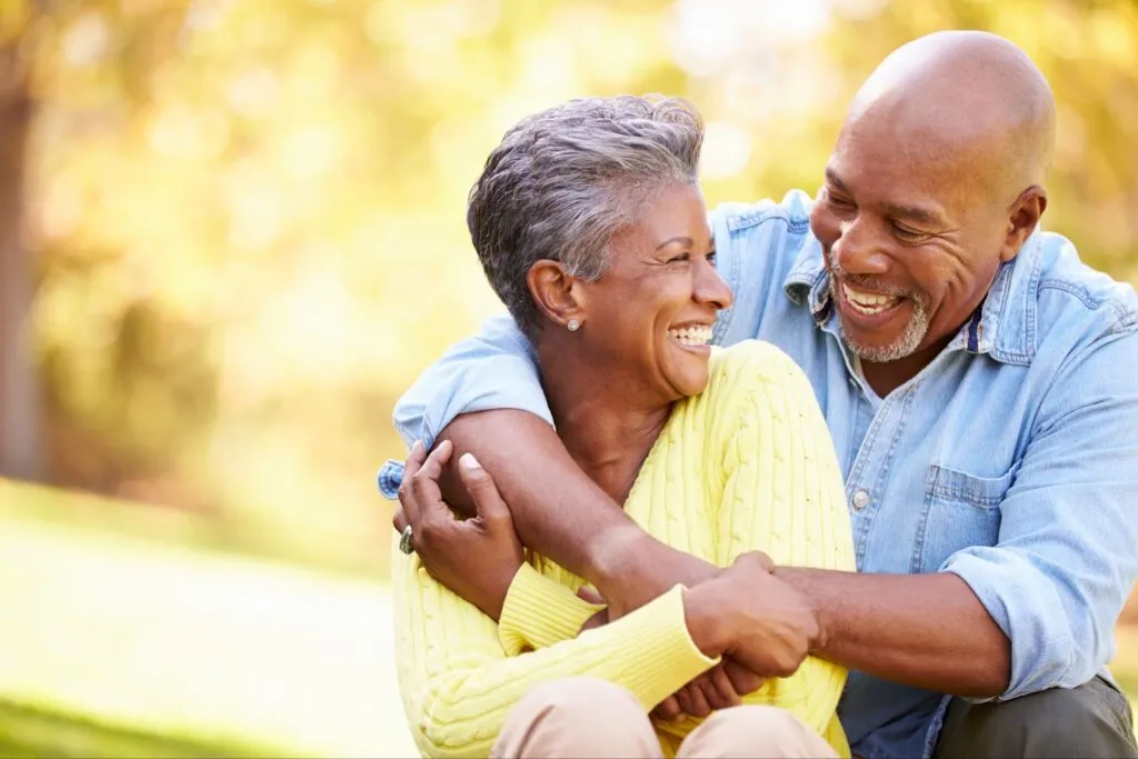 Middle-aged couple laughing